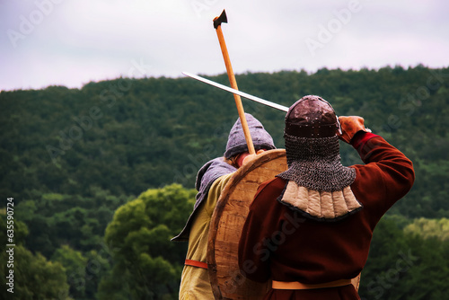 Two fighting viking warriors from early middle ages