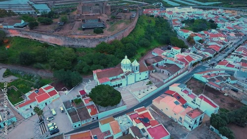Sunset in Castro Marim. Aerial view from a drone. Lighthouse district. Marshes and salt flats of the Ria Formosa Natural Park. Atlantic Ocean. Algarve. Portugal. Europe
