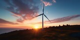 Wind turbine at sunset, alternative energy, environmental.