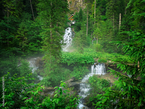 Summer landscape of Seven Springs Waterfall in Bucegi Mountains, Romania, Europe photo