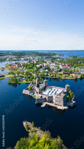 Savonlinna town in the finnish lake district on a beautiful summer day seen from the air