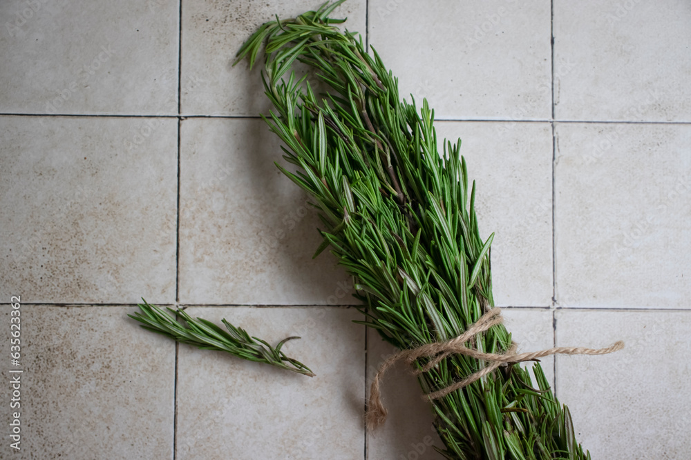 Bunch of fresh rosemary on old background Bunch of fresh rosemary on old background