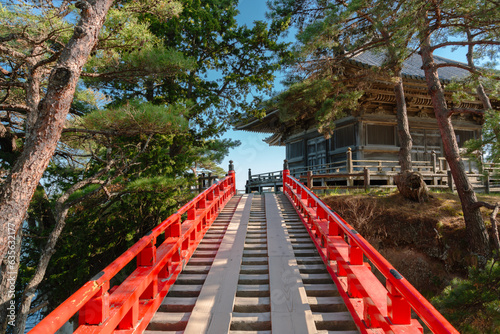 Godaido of Zuiganji Temple and red bridge in Matsushima, Miyagi, Japan photo