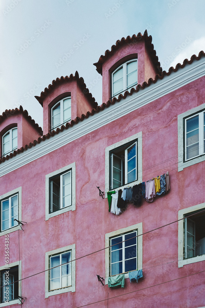 On a pink wall of Alfama, Lisbon.
