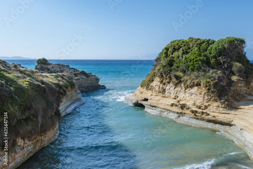 Afionas, Greece - June 19, 2021: Beach over Channel of Love in Sidari village