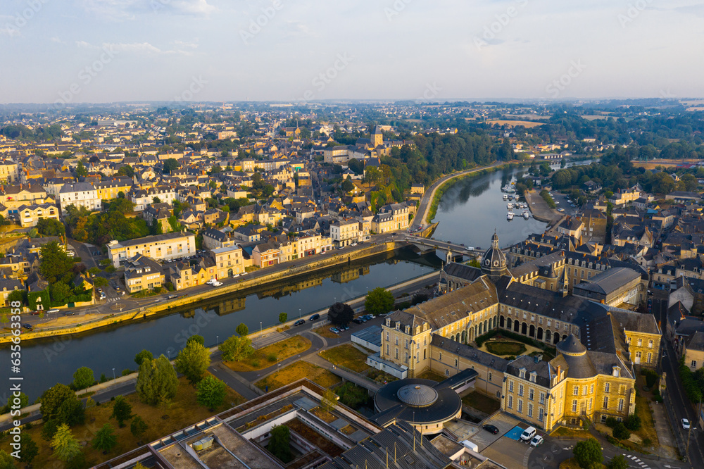 View from drone of houses and Mayenne river at Chateau-Gontier town at sunny summer day, France