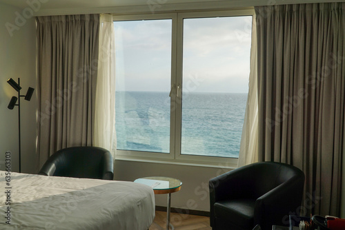 Room with a Spectacular Ocean View: Enjoy the soothing ambiance of a comfortable room while gazing at the endless expanse of the sea. © Emilia