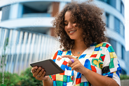 Woman with tablet computer