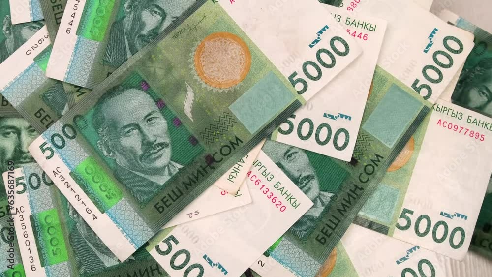 Kyrgyz som banknotes value of 5000, rotate view from above. Five thousand som bill close up in camera motion. 5000 unit Kyrgyz Republic money cash. 