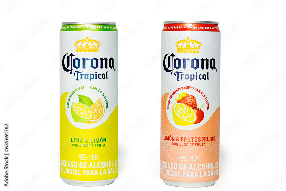 Two cans of Corona fruit based carbonated alcoholic drink isolated on