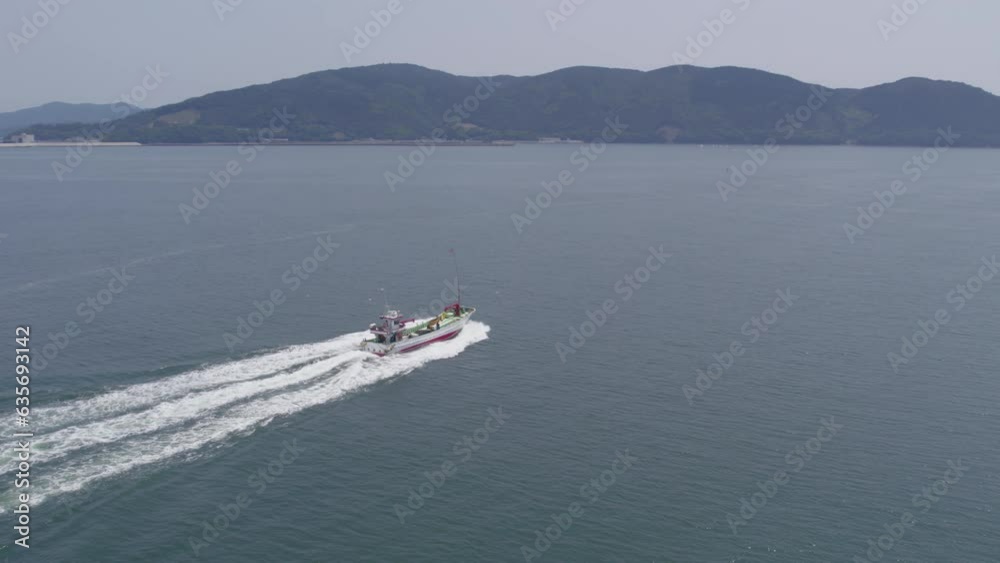 Drone Shot of a Fishing Boat Departing from Ishinomaki Fishing Market Drone Shot of a Fishing Boat Departing from Ishinomaki Fishing Market
