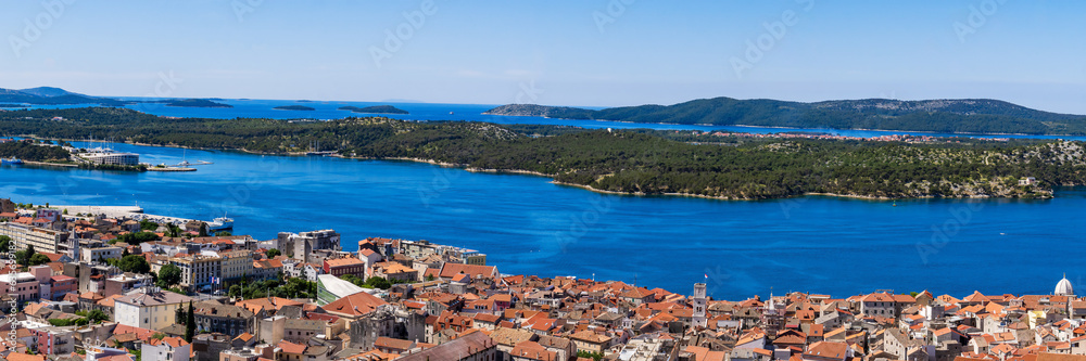 Panorama, wide shot of the Sibenik, Croatia. Aerial view of the Sibenik old city and adriatic sea. Dalmatia. Panorama of the mediterranean city of Sibenik