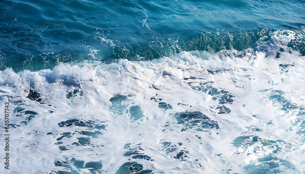 Blue Seawater with sea foam as background , Sea foam
