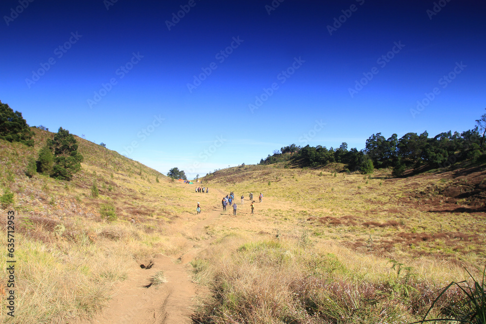 Beautiful view of Mount prau, blue sky and sunrise in the Dieng, Wonosobo, Central Java, Indonesia, August 13, 2023