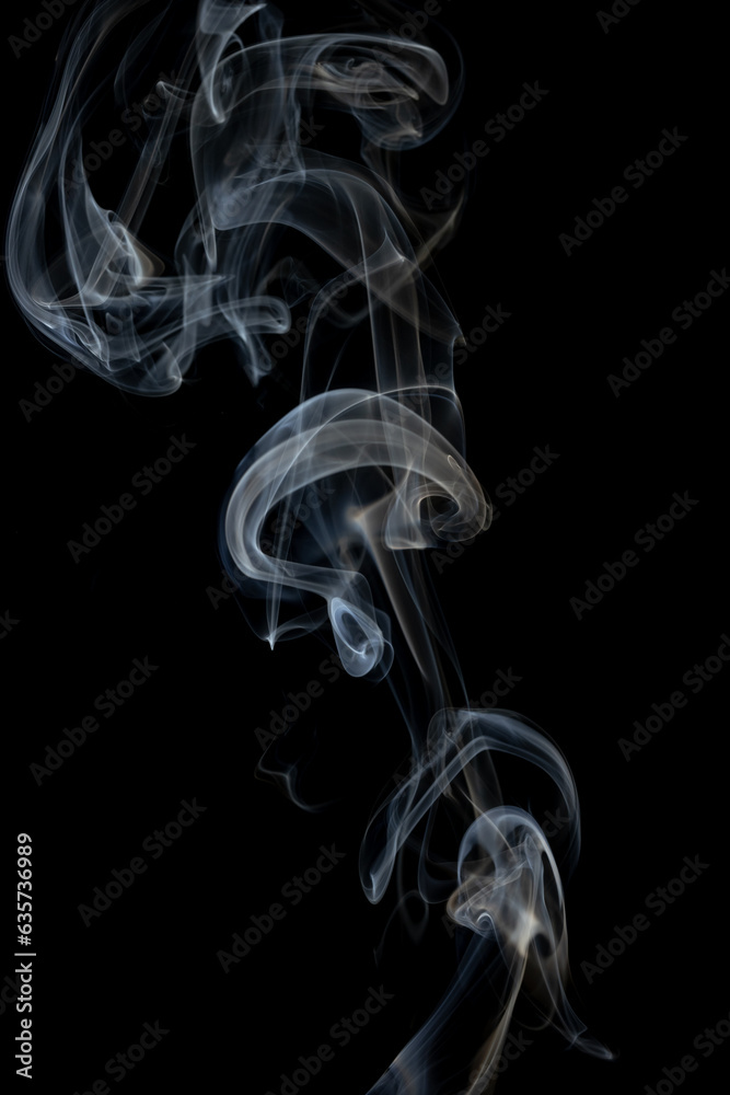 White clouds of smoke with copy space on black background White clouds of smoke with copy space on black background