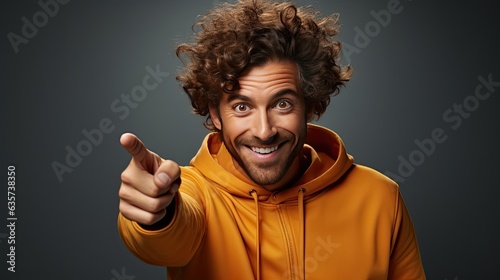 smiling african american man pointing with finger at camera isolated on background