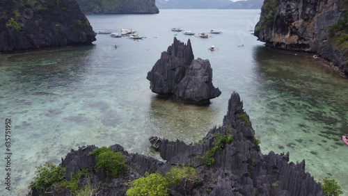 Natural karst limestone formations at the tropical Cadlao Lagoon, El Nido, Philippines, Aerial view photo