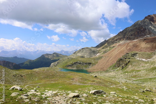 Mountain landscape on a hiking trail leading from Aosta valley to Luseney lake, in Saint Barthelemy valley, Italy