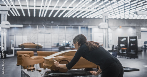 Quadro em tela Portrait of a Female Automotive Designer Sculpting a 3D Clay Model of a New Production Car