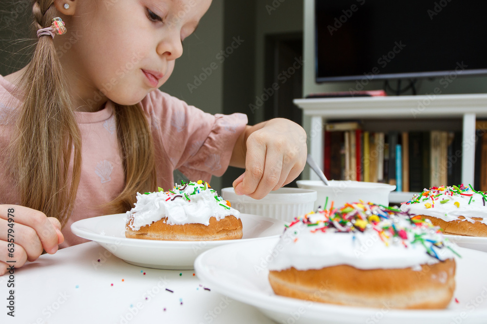 Process of decorating a cake with sweet decorations, concept of cooking of the Easter cake Process of decorating a cake with sweet decorations, concept of cooking of the Easter cake