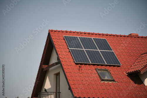 House with solar panels. Concept of sustainable and renewable energy. © AlexGo