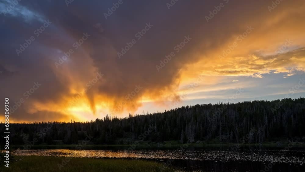 Sunset timelapse as clouds glow as it lightly rains in the wilderness of Utah. Sunset timelapse as clouds glow as it lightly rains in the wilderness of Utah.