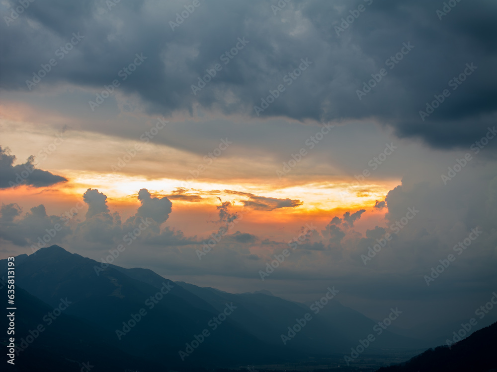 Storm Clouds in sunset lights