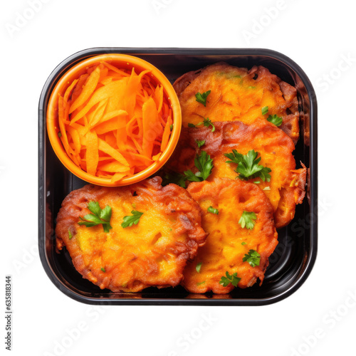 Carrot fritters in a lunchbox top view isolated on transparent background. Generative AI