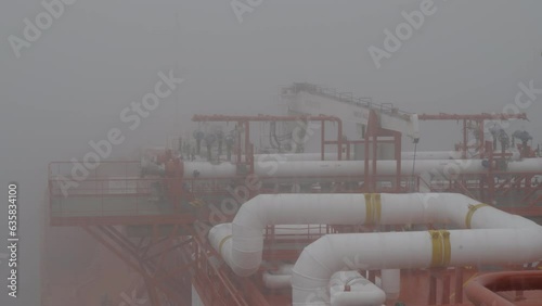 LNG tanker in heavy fog at sea