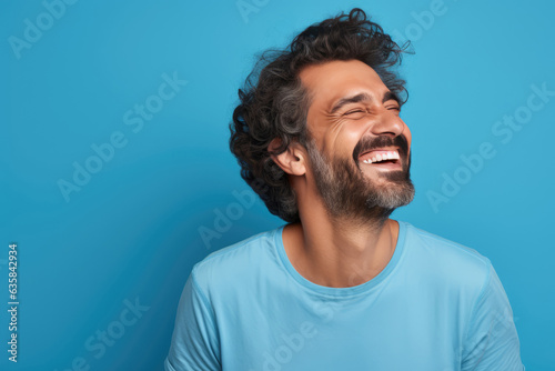 Happy Italian Man On Blue Background photo