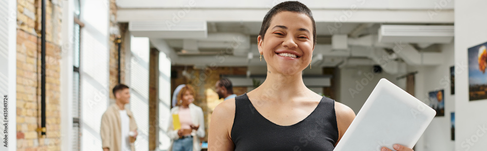 cheerful and tattooed businesswoman looking at camera, startup, generation z, banner, coworking cheerful and tattooed businesswoman looking at camera, startup, generation z, banner, coworking