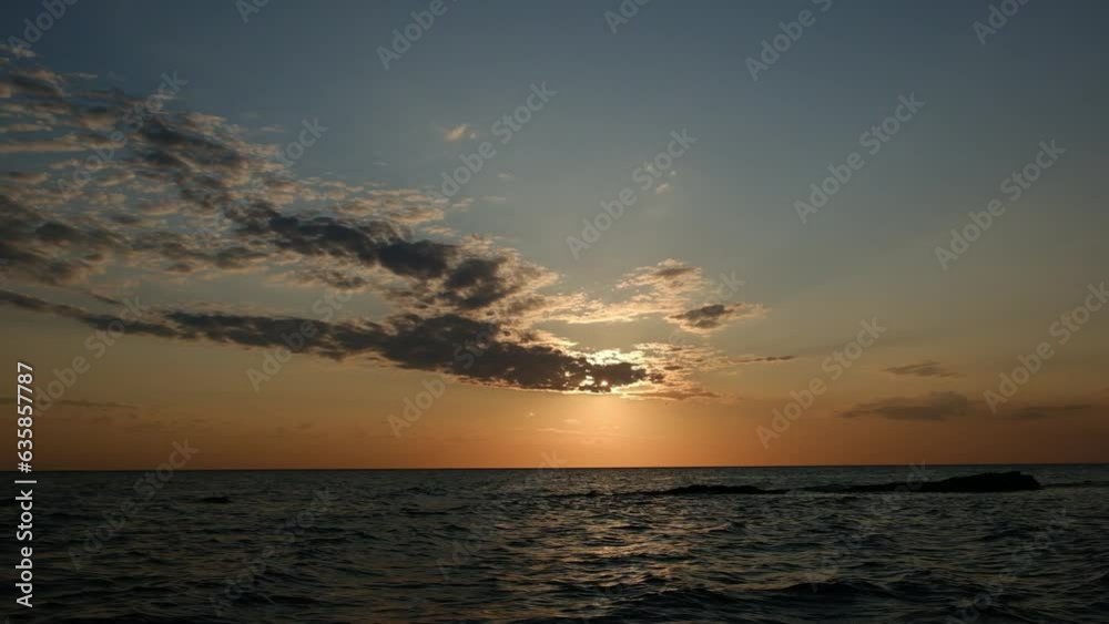 The sea against the background of the sunset The sea against the background of the sunset