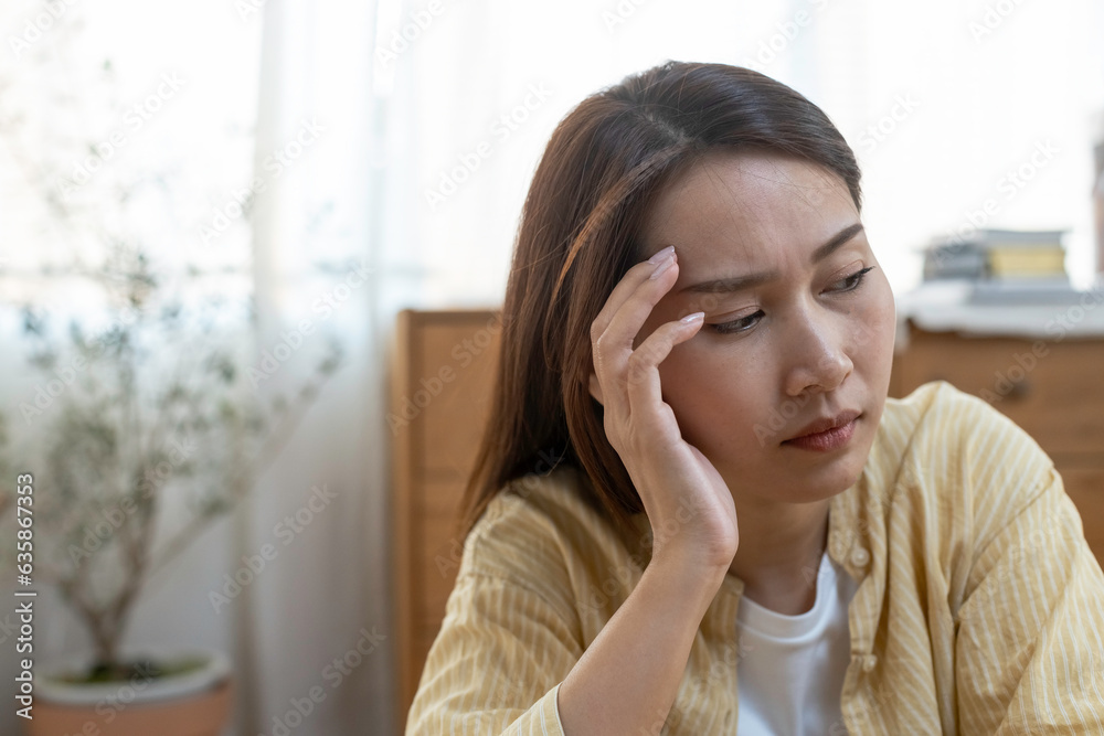 woman hand touching head have headache, young asian female stressed from hard work, life problems tired discouraged, disappointed in love, Girl suffering depression and alone. woman hand touching head have headache, young asian female stressed from hard work, life problems tired discouraged, disappointed in love, Girl suffering depression and alone.
