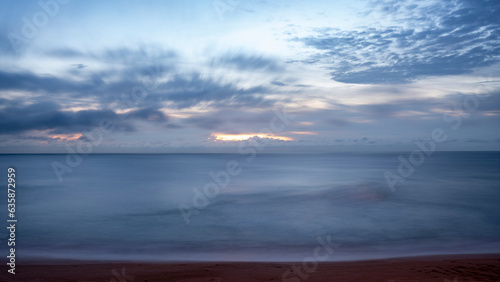 Milky ocean, sunrise, slow shutter speed, morning at Ormond Beach, Florida