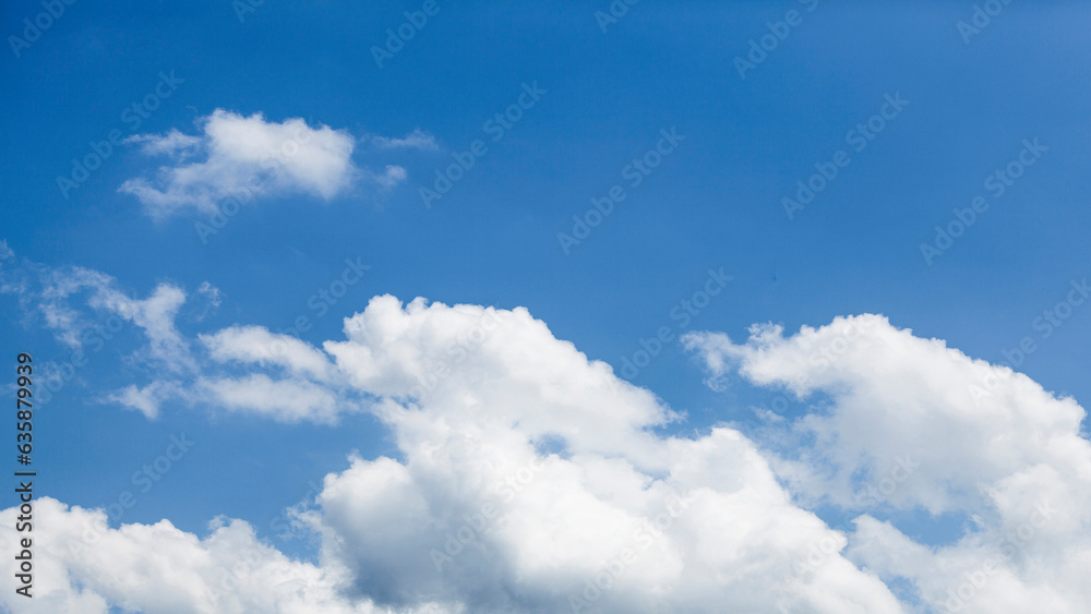 Fototapeta premium White clouds on blue sky, weather concept