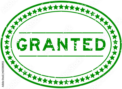 Grunge green granted word oval rubber seal stamp on white background