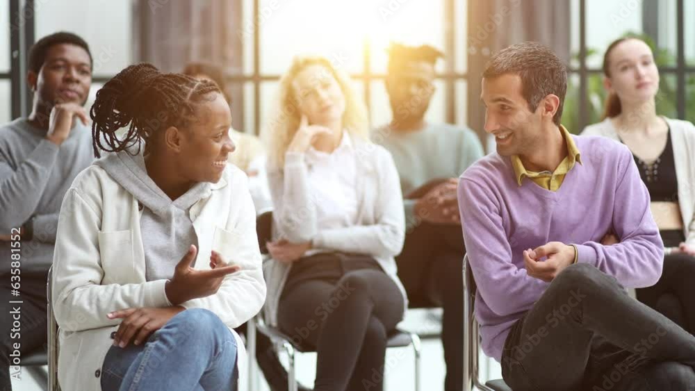 Different groups of people communicate with each other during business seminar or training. Different groups of people communicate with each other during business seminar or training.