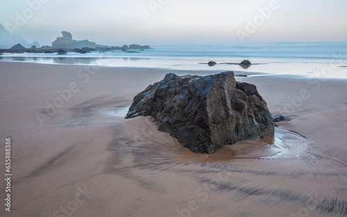 Misty morning at a rocky beach (Praia do Castelejo) at the Atlantic southwest coast of Portugal
 photo