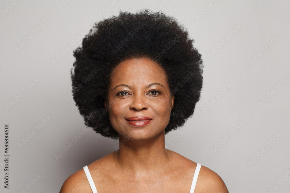Healthy mature model woman looking at camera. Female face Healthy mature model woman looking at camera. Female face