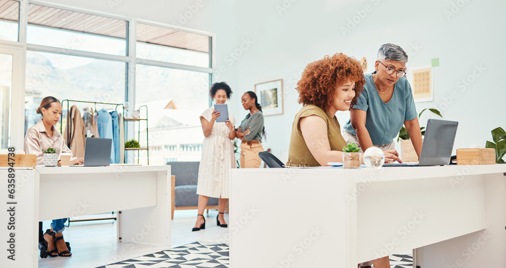 Fototapeta premium Designer group, workshop and fashion startup with computer, talking and planning with ideas, creativity or goals. Women, company and teamwork with fabric, clothes and support for vision in Cape Town