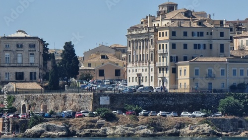 corfu city center buildings  sailboat  greece photo