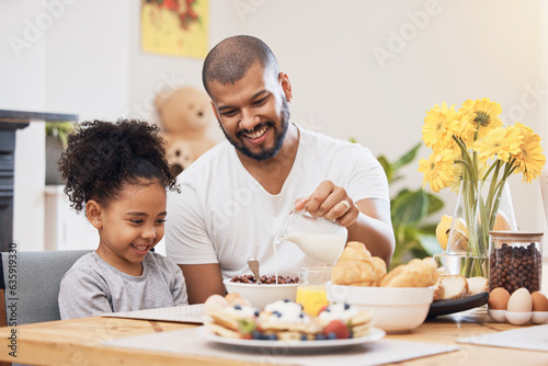Home, breakfast and father with girl, cereal and help with milk, nutrition and family with food. Male parent, child and kid with healthy meal, start the day and dad with support, hungry and happy
