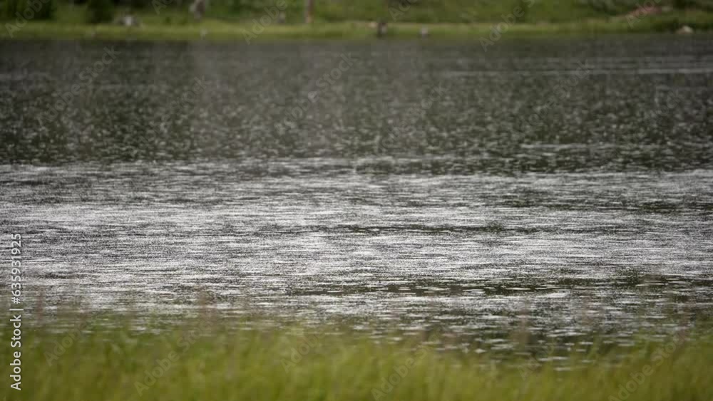 View of lake as rain falls during storm in the wilderness at Lyman Lake in Utah. View of lake as rain falls during storm in the wilderness at Lyman Lake in Utah.
