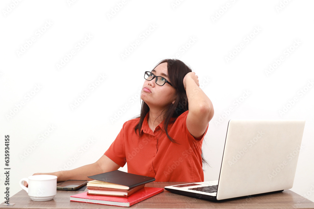 Confused young asian entrepreneur woman thinking something while looking above. Isolated on white Confused young asian entrepreneur woman thinking something while looking above. Isolated on white