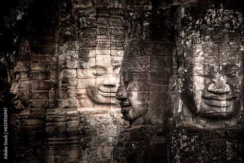 Ancient faces carved in stone at Bayon temple, Angkor Wat, UNESCO World Heritage Site, Cambodia, Indochina, Southeast Asia, Asia photo