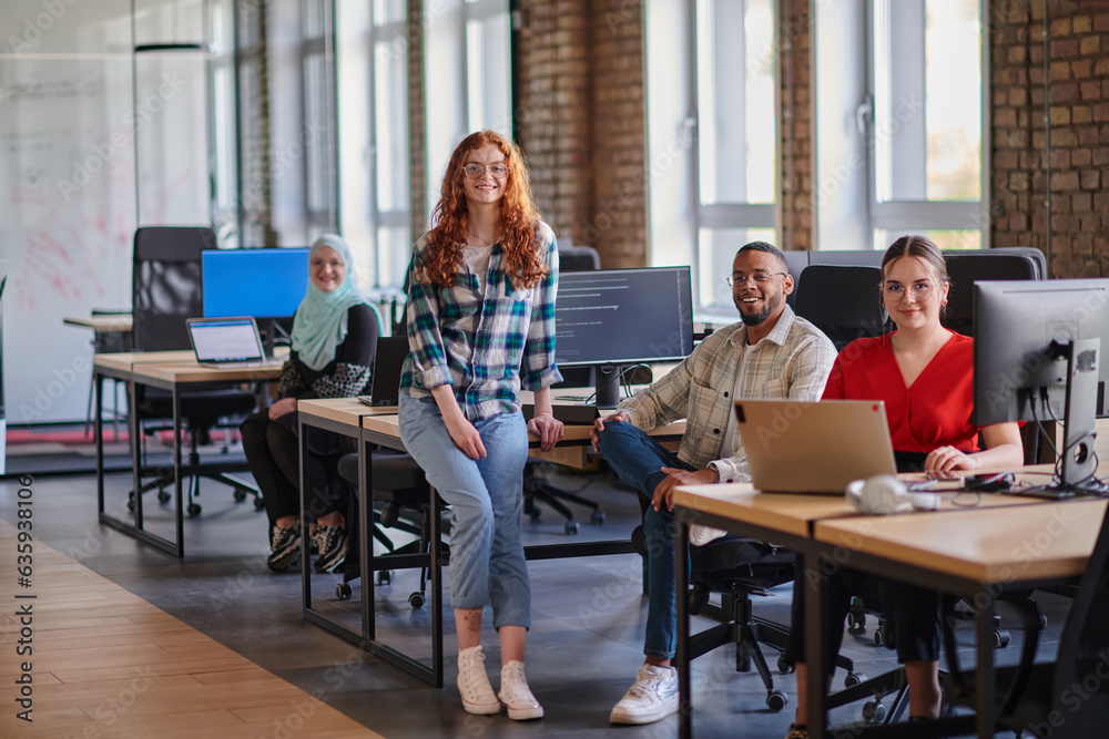 A diverse group of young business individuals congregates in a modern startup coworking center, embodying collaborative innovation and a dynamic atmosphere.