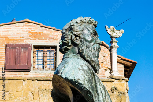 Statue of Benvenuto Cellini and sundial, Ponte Vecchio, Florence (Firenze), UNESCO World Heritage Site, Tuscany, Italy photo