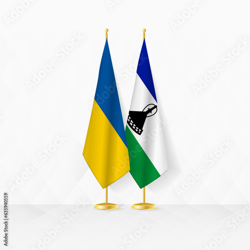 Ukraine and Lesotho flags on flag stand, illustration for diplomacy and other meeting between Ukraine and Lesotho.