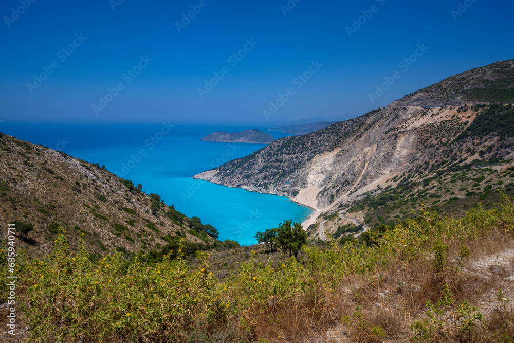 View of Myrtos Beach, coastline, sea and hills near Agkonas, Kefalonia, Ionian Islands, Greek Islands, Greece View of Myrtos Beach, coastline, sea and hills near Agkonas, Kefalonia, Ionian Islands, Greek Islands, Greece
