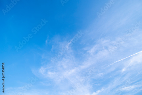 Blue sky and white fluffy tiny clouds background and pattern